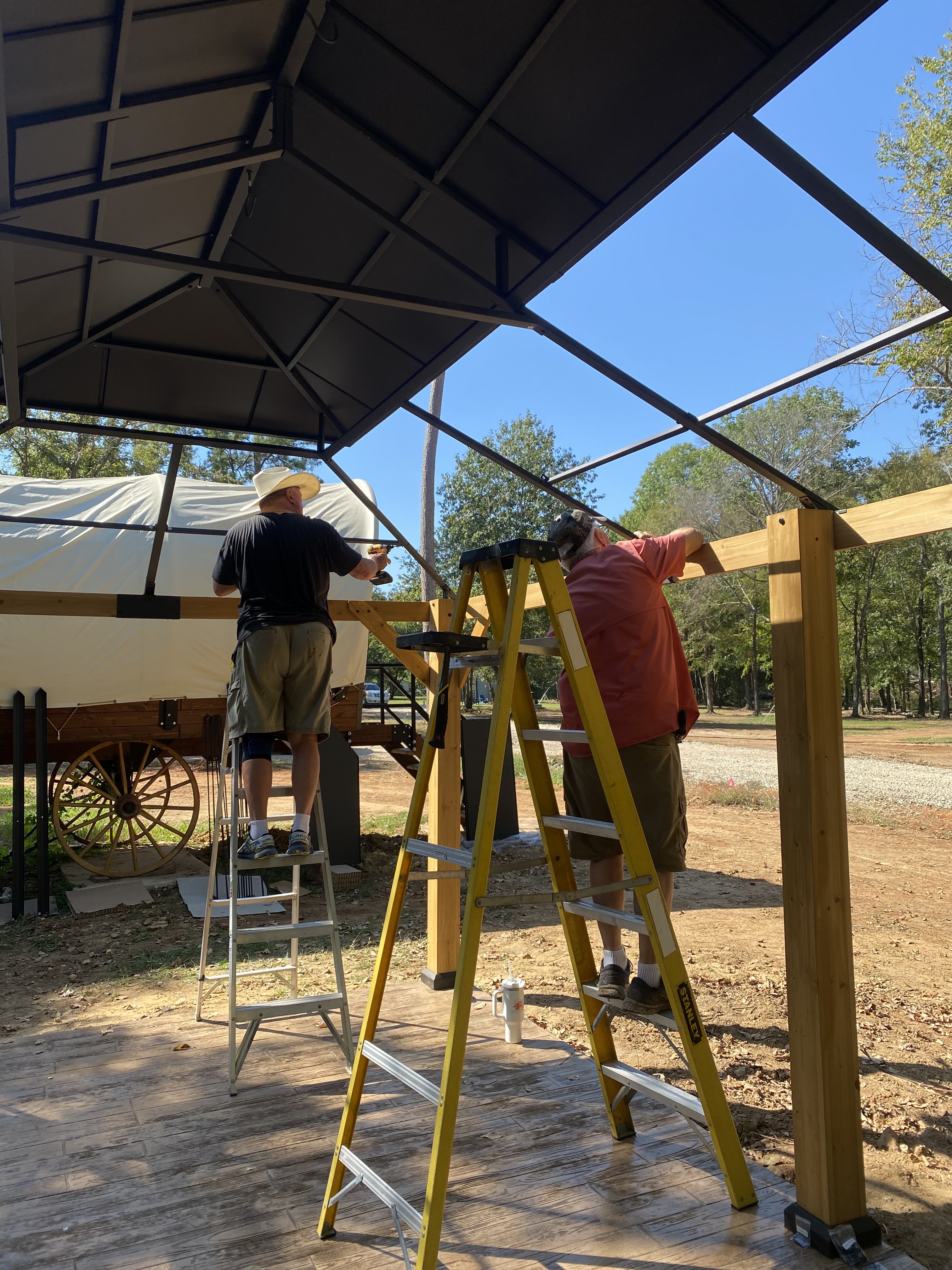 Bob and Lisa's dad building a pergola at Blue Pond Retreat